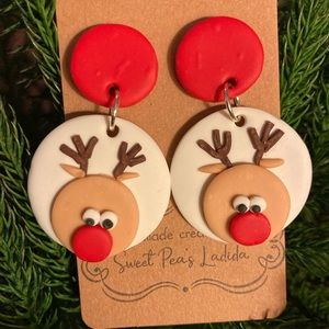 Reindeer Christmas dangle earrings with red studs. Handmade polymer clay.